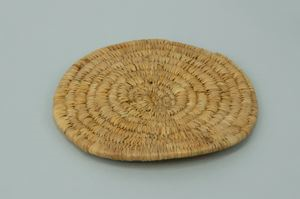 Image: round coiled grass mat, plain